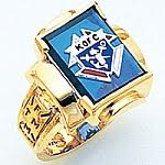 Emblem of the Order Ring shown with Blue Spinel Stone